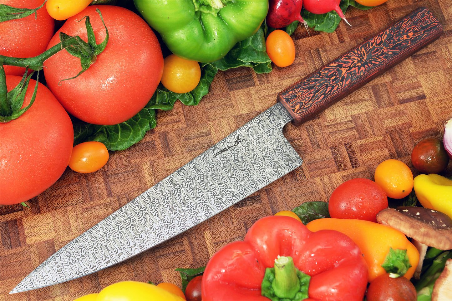 Chef Knife with a Ladder Pattern Damasteel Blade and Mars Valley Sculpted Handle