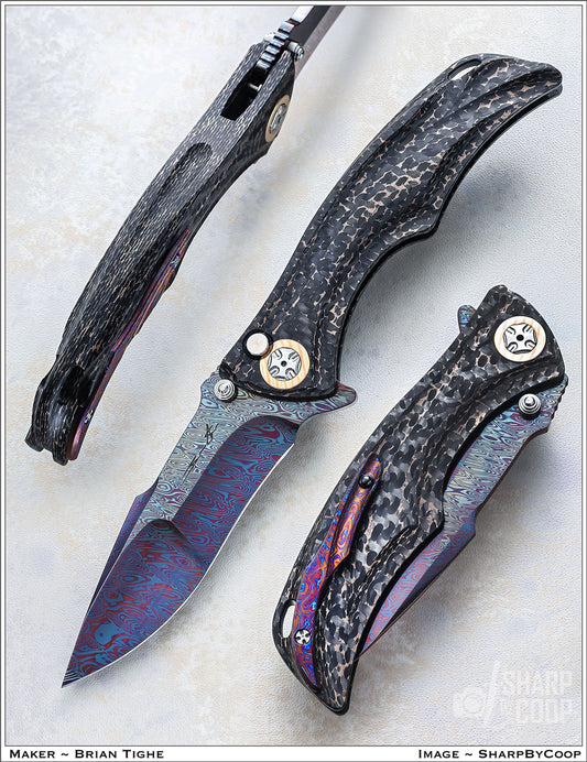Tighe Down Carbon Fiber Infused with Bronze Integral With Colored Damasteel Blade.